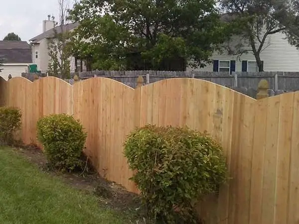 Wood Fence With Convex Top for Indianapolis Property Owners